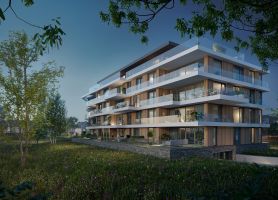 Nachtimpressie van de nieuwbouwappartementen in Land van Anna in Goirle, met warme verlichting en zicht op de moderne gevels.