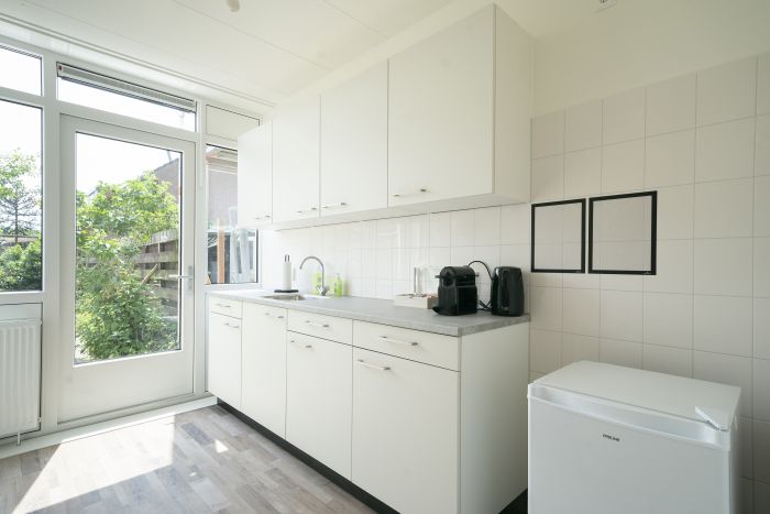 Vernieuwde keuken in een woning aan de Herculesstraat in Rosmalen, gerealiseerd tijdens het groot onderhoudsproject.