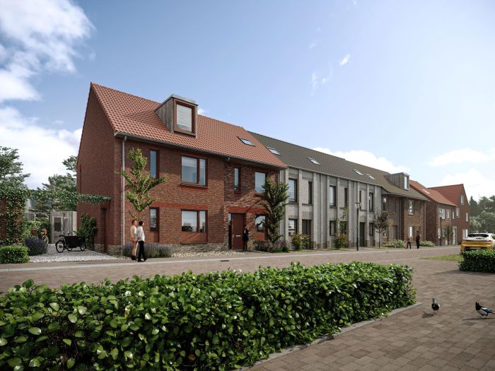 Nieuw Absbroek Geleen – impressie van rijwoningen met rode dakpannen en afwisselend rood/grijs metselwerk, groene straat met bewoners